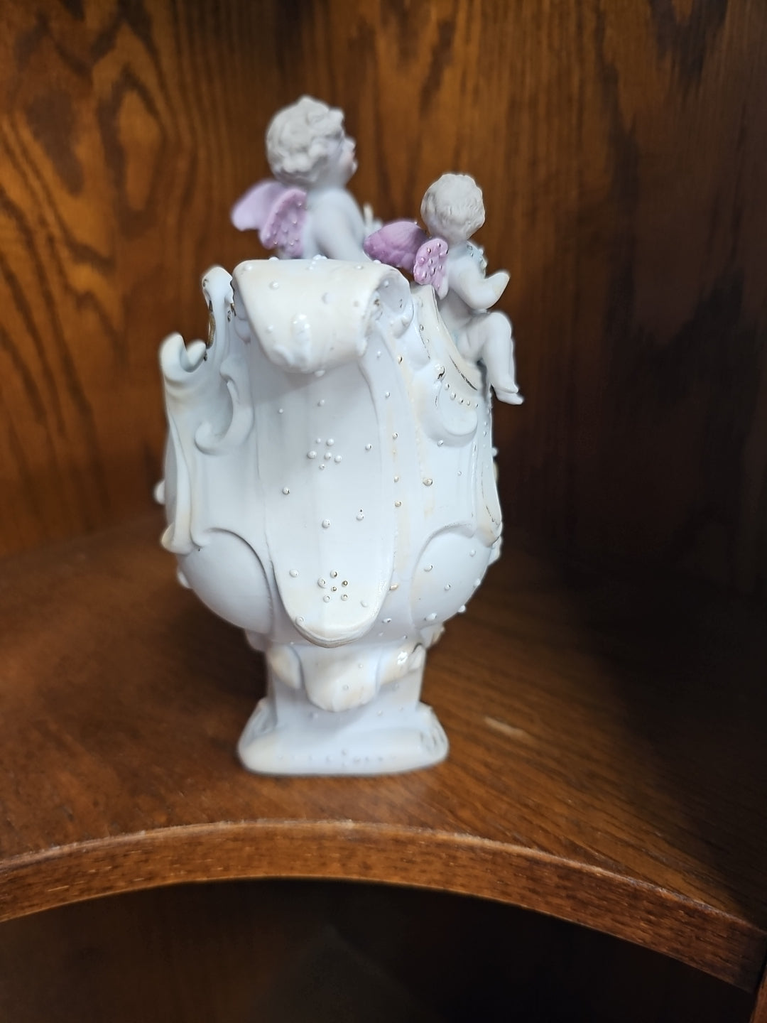 Antique German Bisque Angel figurine on a victorian shoe