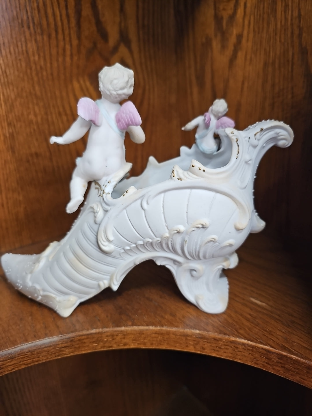Antique German Bisque Angel figurine on a victorian shoe