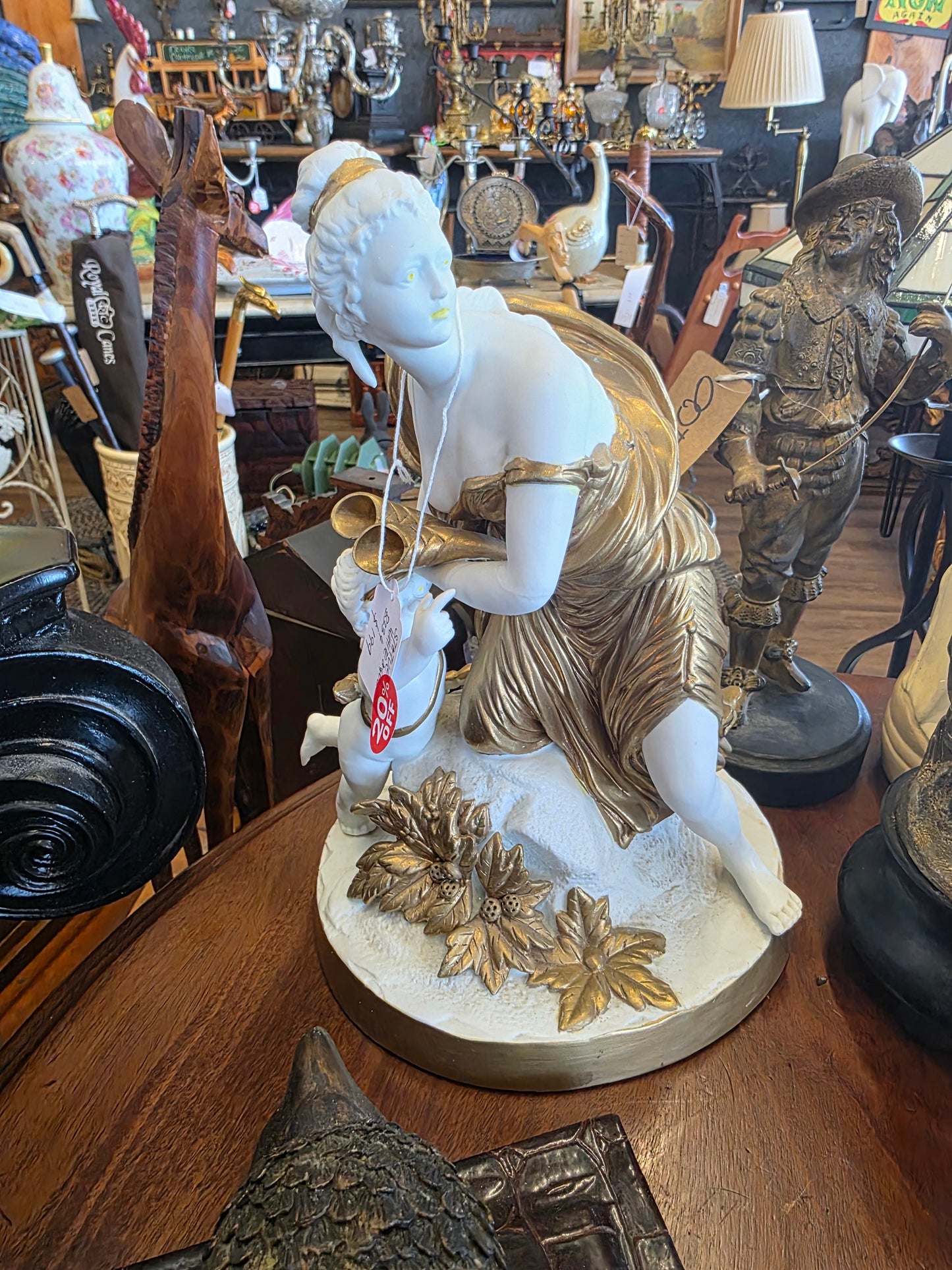 Astonishing bisque porcelain and gold sculpture, statue