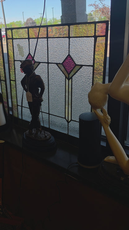 Pair of antique stained glass windows