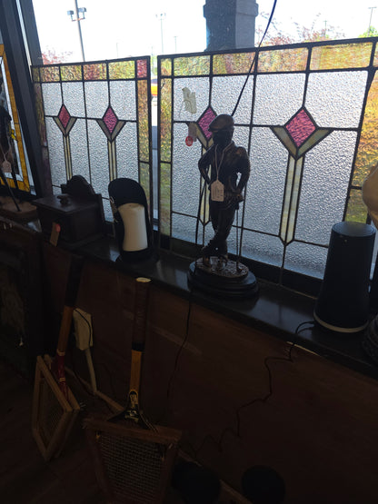 Pair of antique stained glass windows